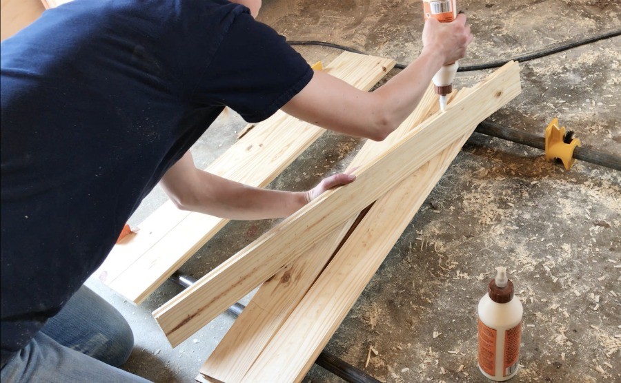 glue up tongue and groove boards to create diy wooden stove top cover top