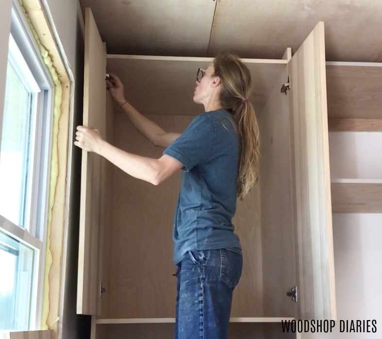 Shara Woodshop Diaries installing kitchen cabinet doors onto pantry