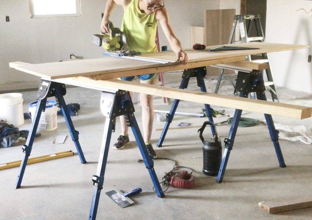 Shara Woodshop Diaries  cutting down plywood using Kreg AccuCut on saw horses