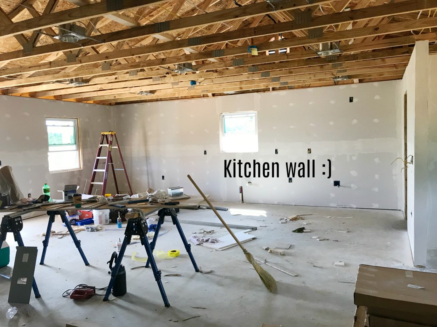 Kitchen wall of unfinished garage apartment