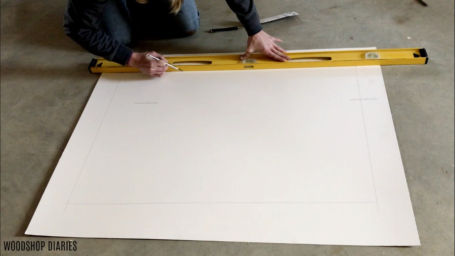 Marking and cutting large mat board using exacto knife and level