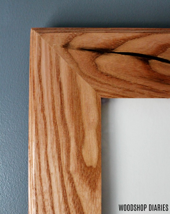 Close up of top corner of custom built frame using Kentucky Coffee wood