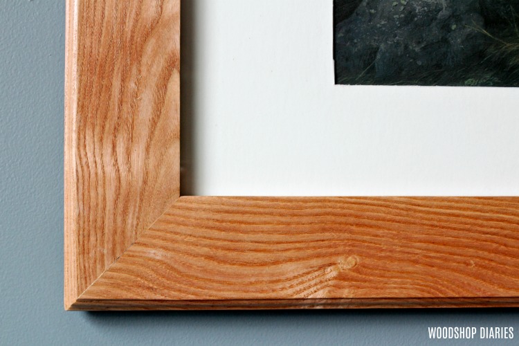 Close up of mitered corners and decorative edges of DIY custom picture frame
