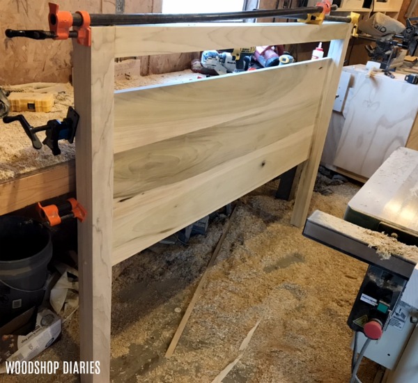 Glue and clamp head board assembly