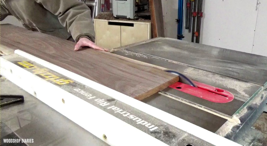 Cut down walnut boards to make DIY modern shelf