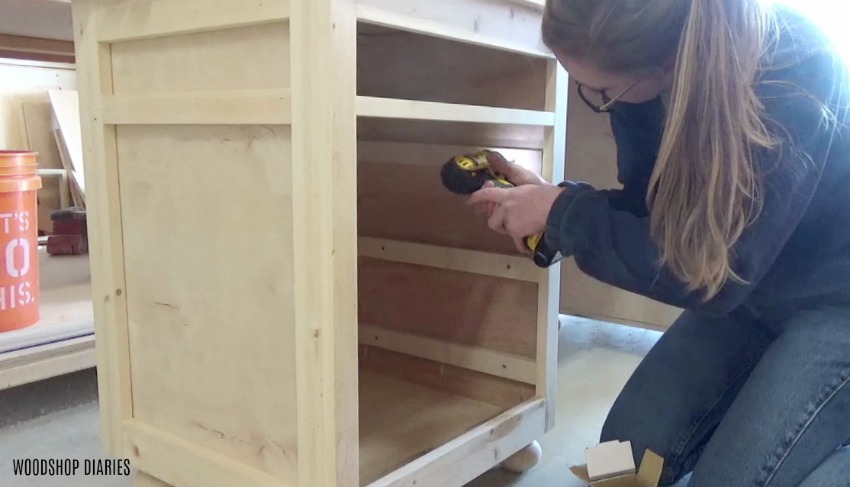 Shara Woodshop Diaries installing spacer blocks to mount drawer slides onto in desk with face frame