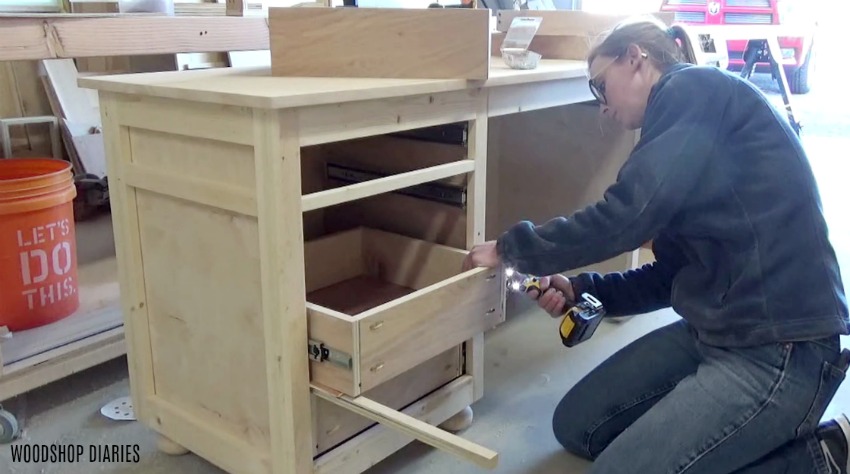 Installing drawer boxes onto drawer slides of diy storage desk