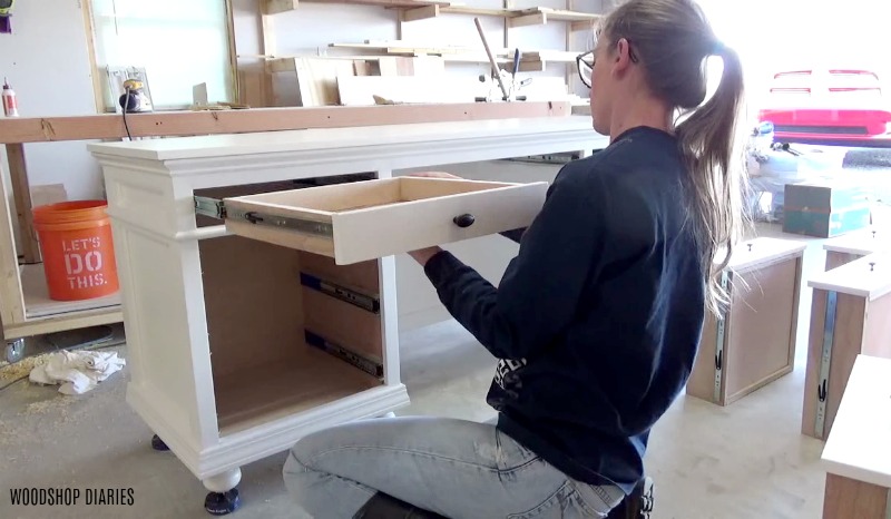 Shara Woodshop Diaries installing drawer into top of DIY storage desk