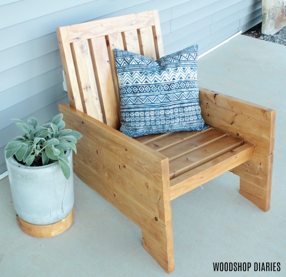 Overhead view of DIY modern outdoor chair sitting next to concrete planter with wooden base