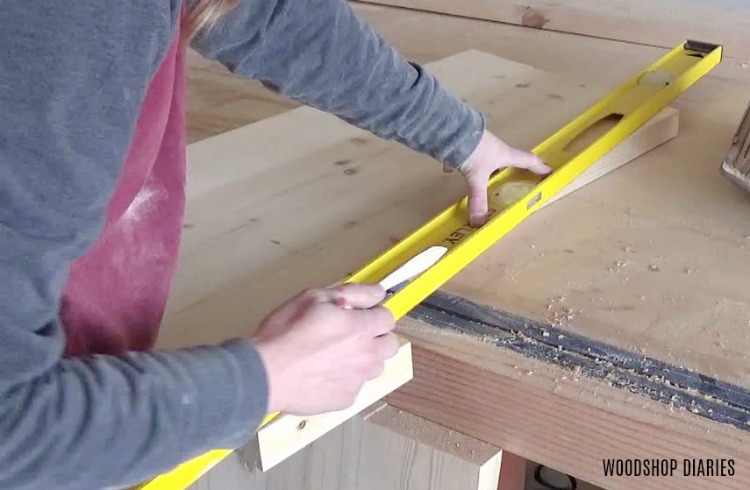 marking the side of DIY modern outdoor chair to trim 