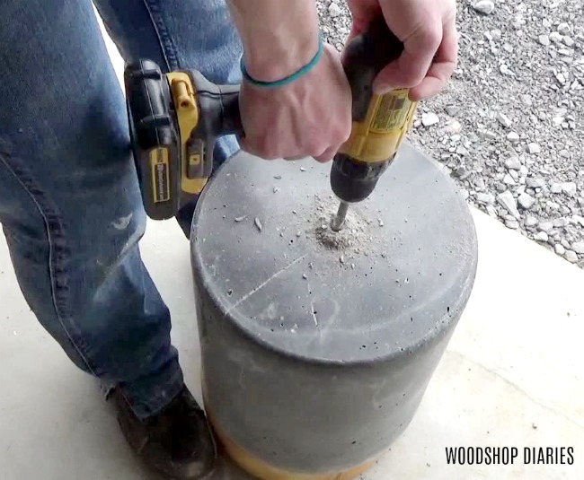 Drill draining hole in DIY concrete planter pot