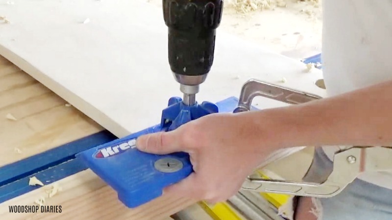 Using Kreg concealed hinge jig to drill concealed hinge cup holes into tilt out hamper doors