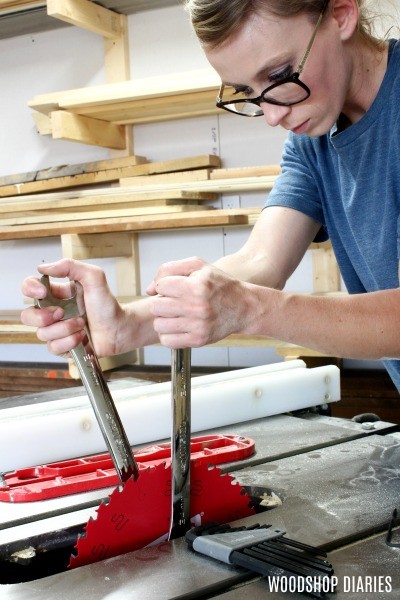 Shara installing new blade onto table saw