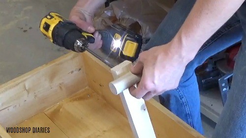 Assembling decorative wooden wagon handle using drill