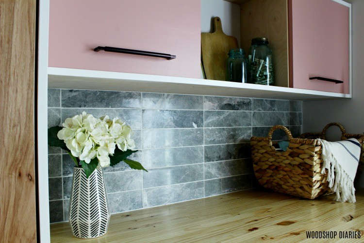 Tundra Grey tile installed as backsplash in laundry nook