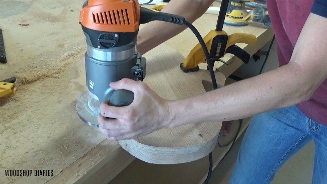 Using router to smooth edges of pumpkin shape.