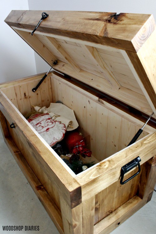 Hope chest storage trunk open with soft close mechanisms 