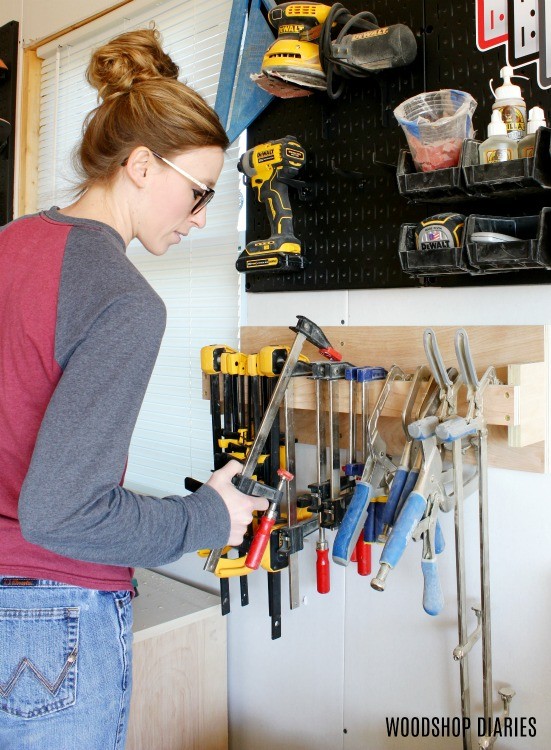 Shara Woodshop Diaries hanging clamps on DIY clamp rack storage system