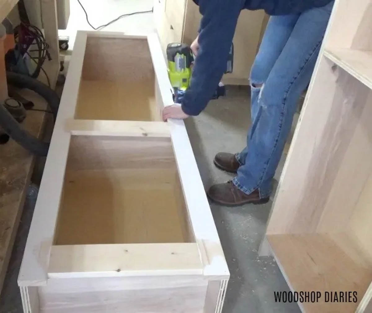 Glue and nail face frame onto cabinet boxes