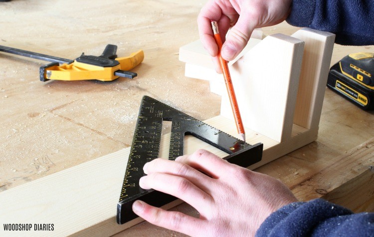 draw 1 ⅜" space between pipe clamp rack divider blocks