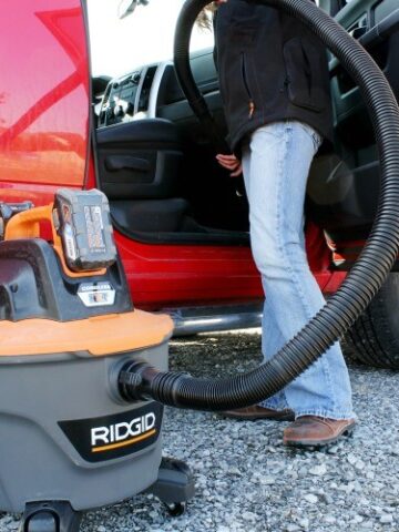 Ridgid Cordless Vacuum cleaning out truck