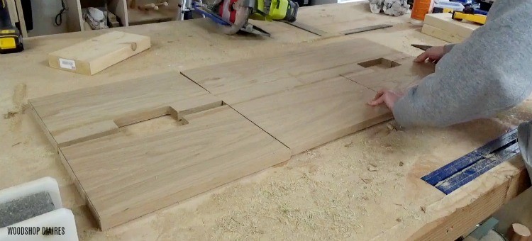 front pieces of vanity dresser laid out on workbench top