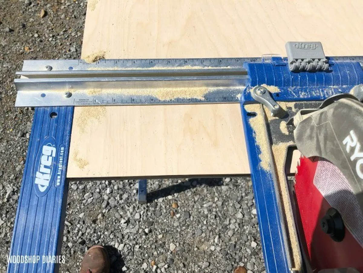 Line rip cut straight edge guide up with edge of plywood sheet