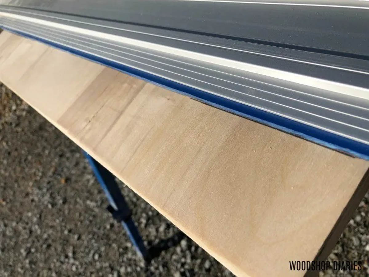 Accu Cut plywood cutting guide lined up with cut marks
