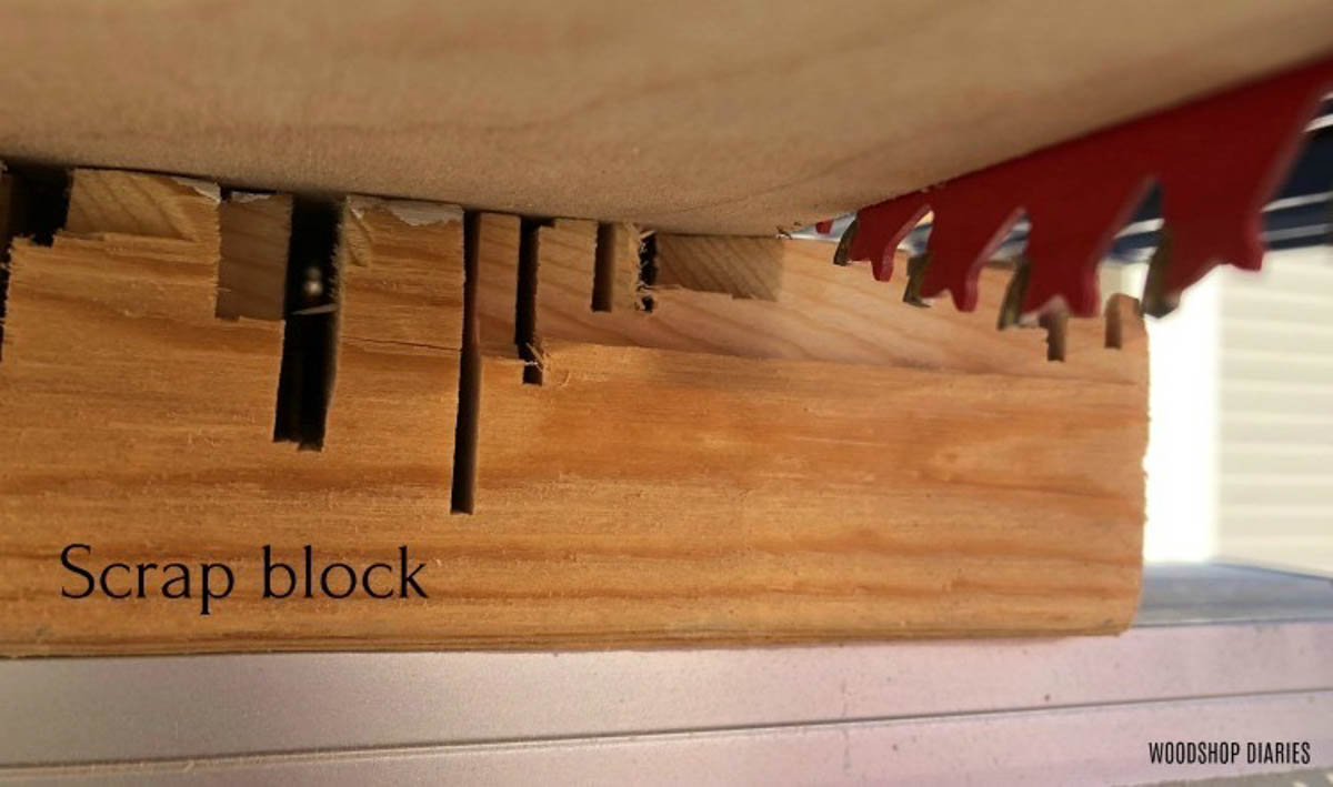 Use scrap wood block under plywood sheet for cutting