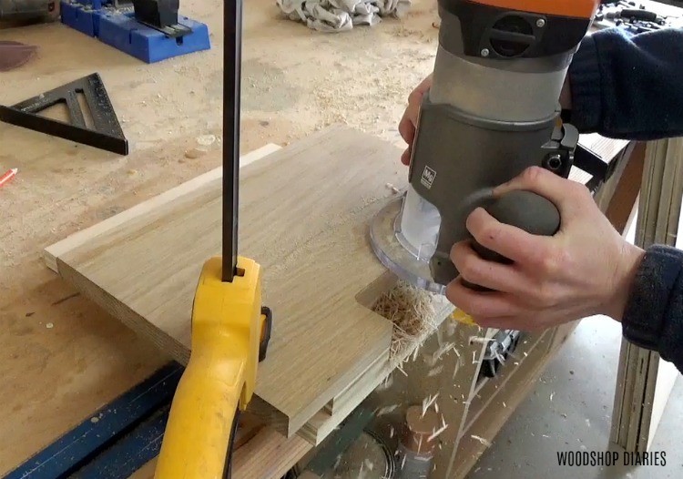 Use router and flush bit to clean up drawer pull notches