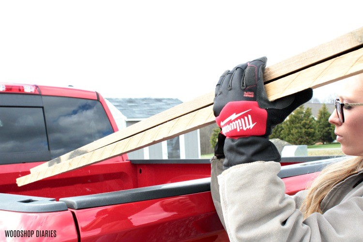 Winter work gloves use to load rough lumber into truck bed