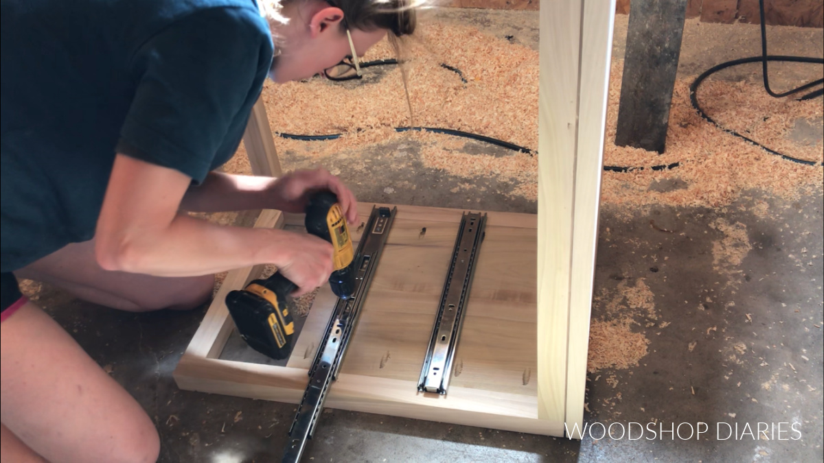 Shara installing drawer slides into modern nightstand