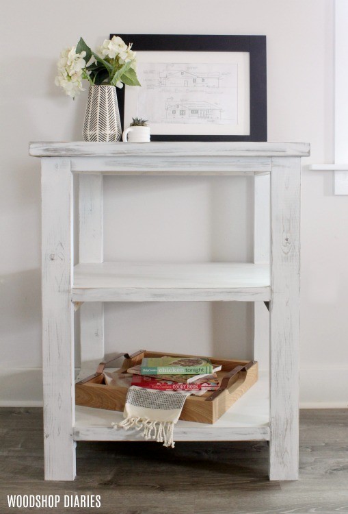 Front angle view of distressed coffee bar table staged for kitchen