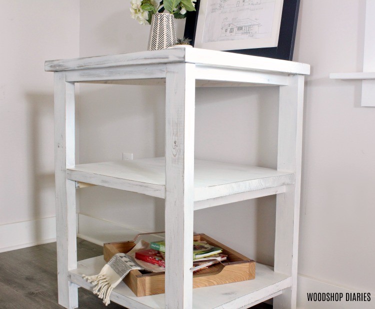 Angled view of distressed farmhouse style coffee station table