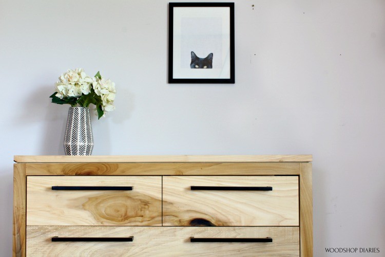 Close up of handles on 5 drawer dresser finished