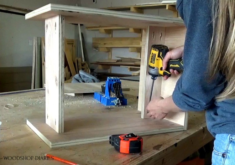 Attach seat support and shelf to plywood stool