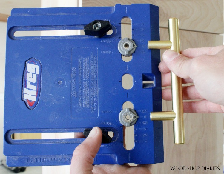 Showing settings on cabinet hardware jig to match cabinet pulls