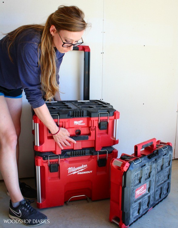 Shara placing middle compartment back onto base