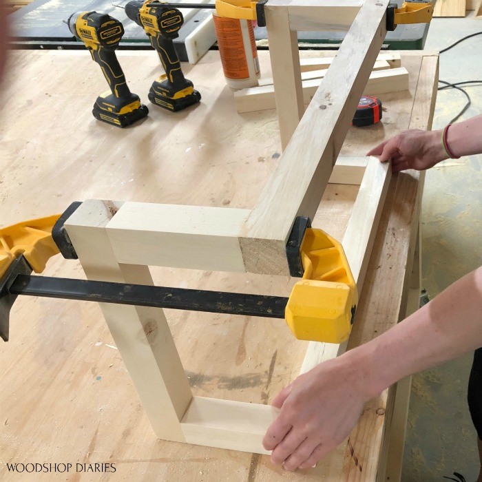 Towel rack assembly on workbench placing pieces before clamping