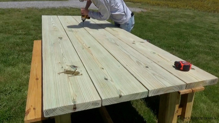 Attaching 2x10 treated boards to trestle table base frame using 3" wood screws