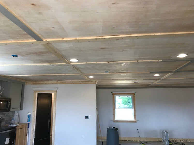 Trim installed on ceiling seams