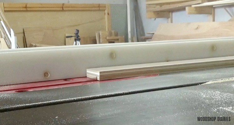 Cut dado in plywood mirror frame board on table saw
