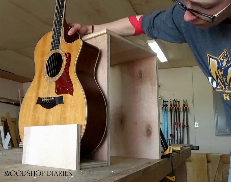 Test fit guitar into guitar stand stool combo