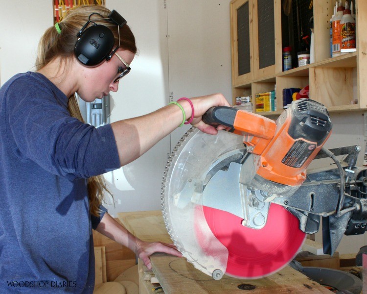 Shara wearing 3M Worktunes while using Miter Saw