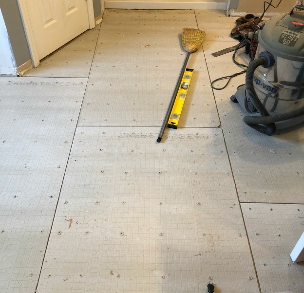 Cement board laid on bathroom floor