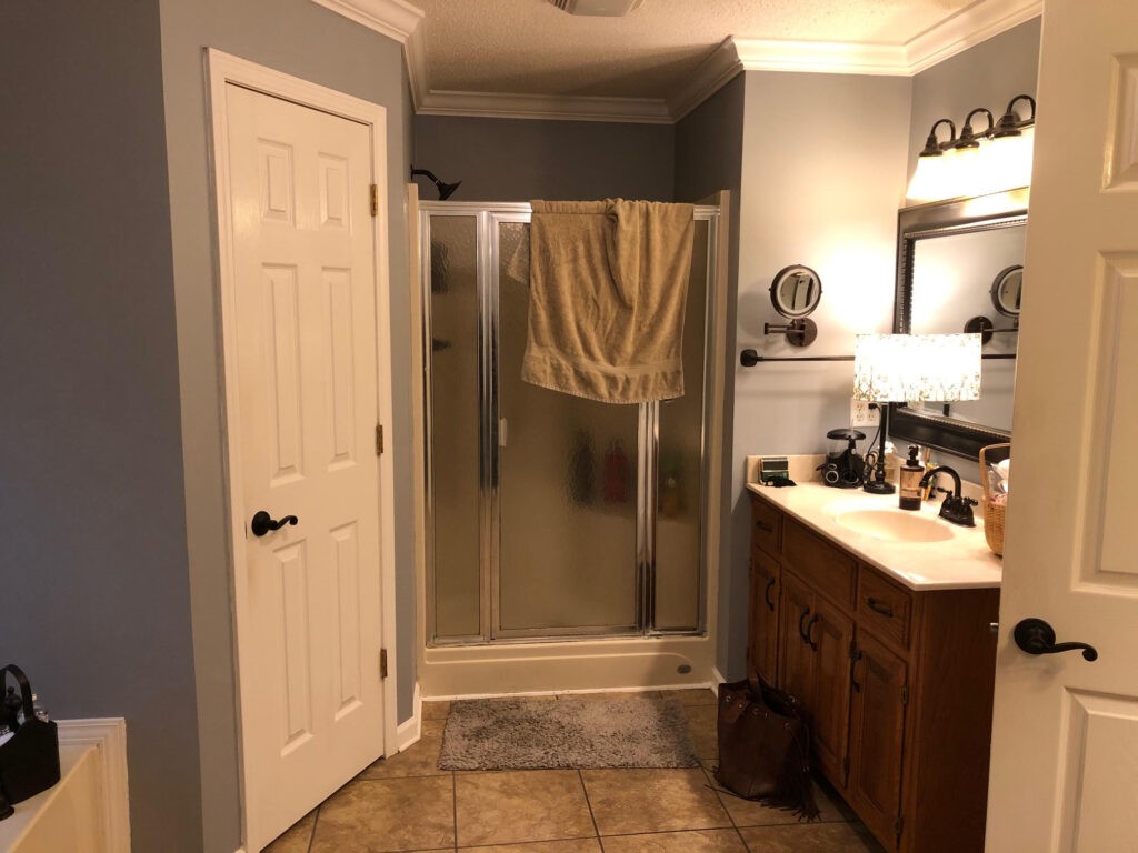 Mom and dads master bathroom before--shower and vanity