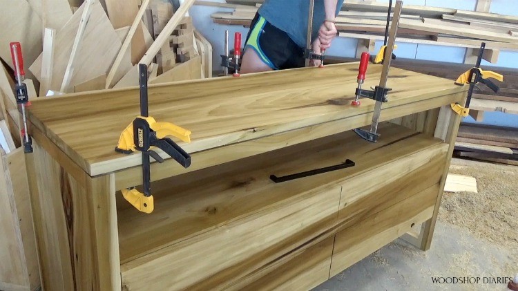 clamping top of modern dresser onto base