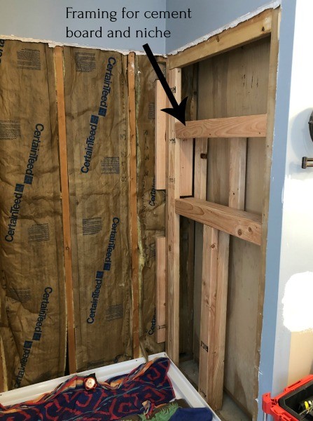 Framing installing into right wall of shower area for niche