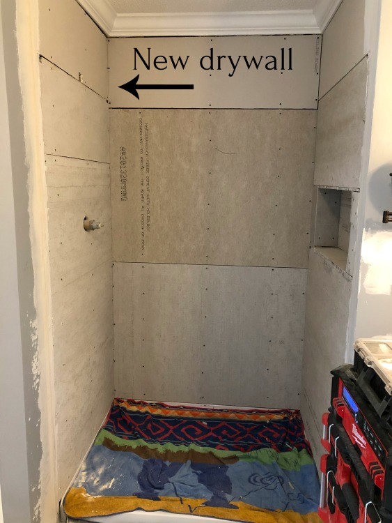 Shower nook with cement board and drywall installed ready for tile