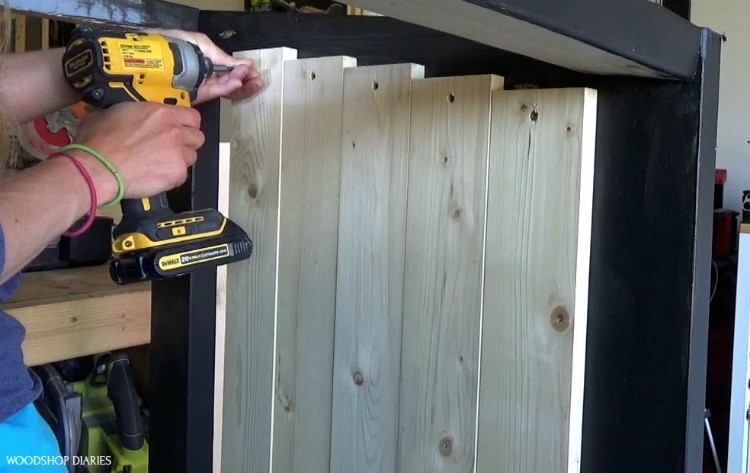 Attaching side slats to trash can cover frame on inside